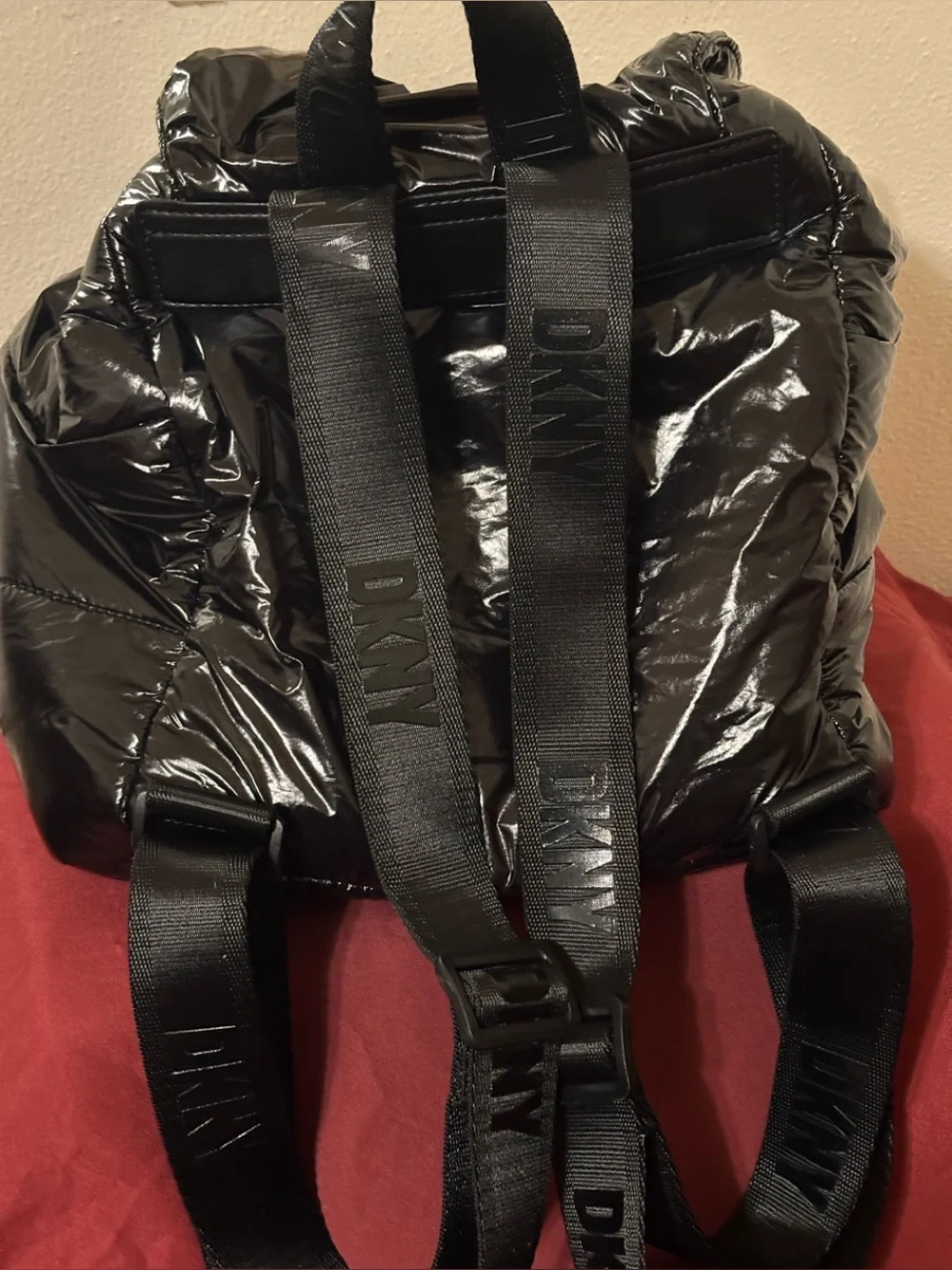 DKNY Shiny Black Quilted Nylon Puffer Backpack
